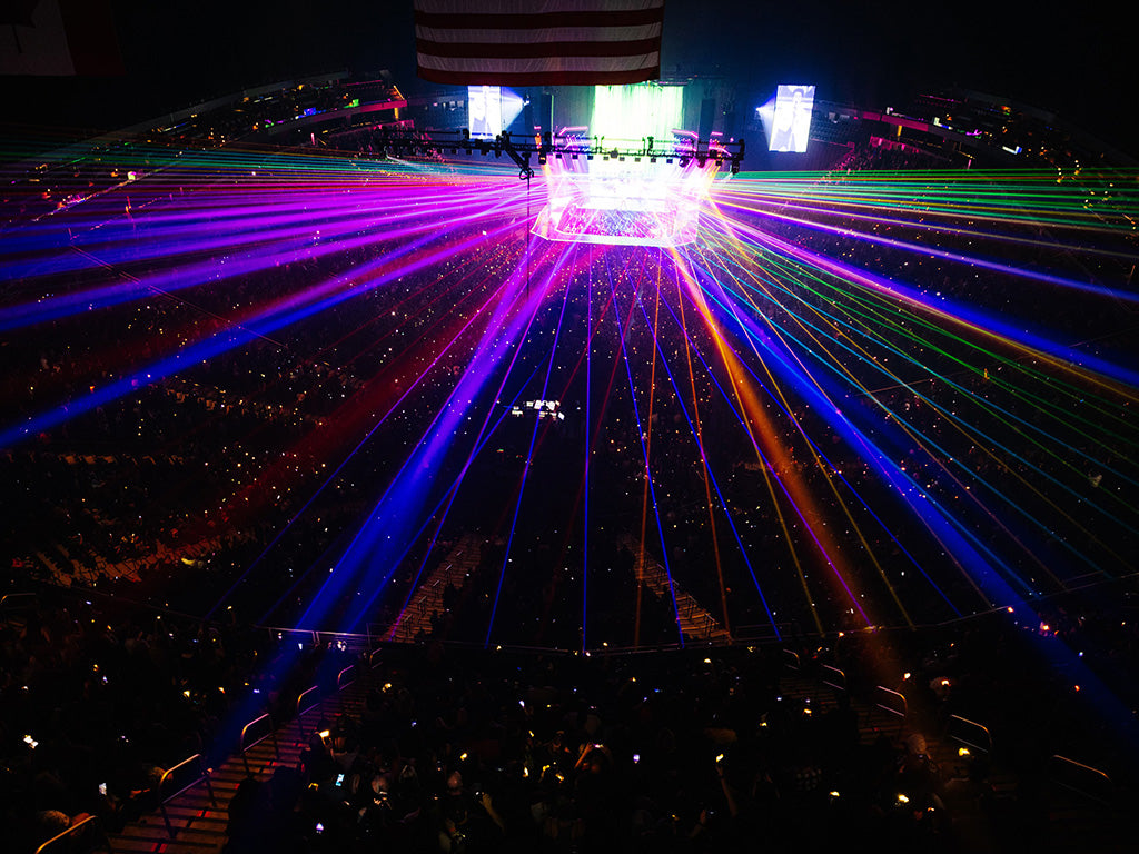 Beams shine overhead of audience at Panic! At The Disco Tour