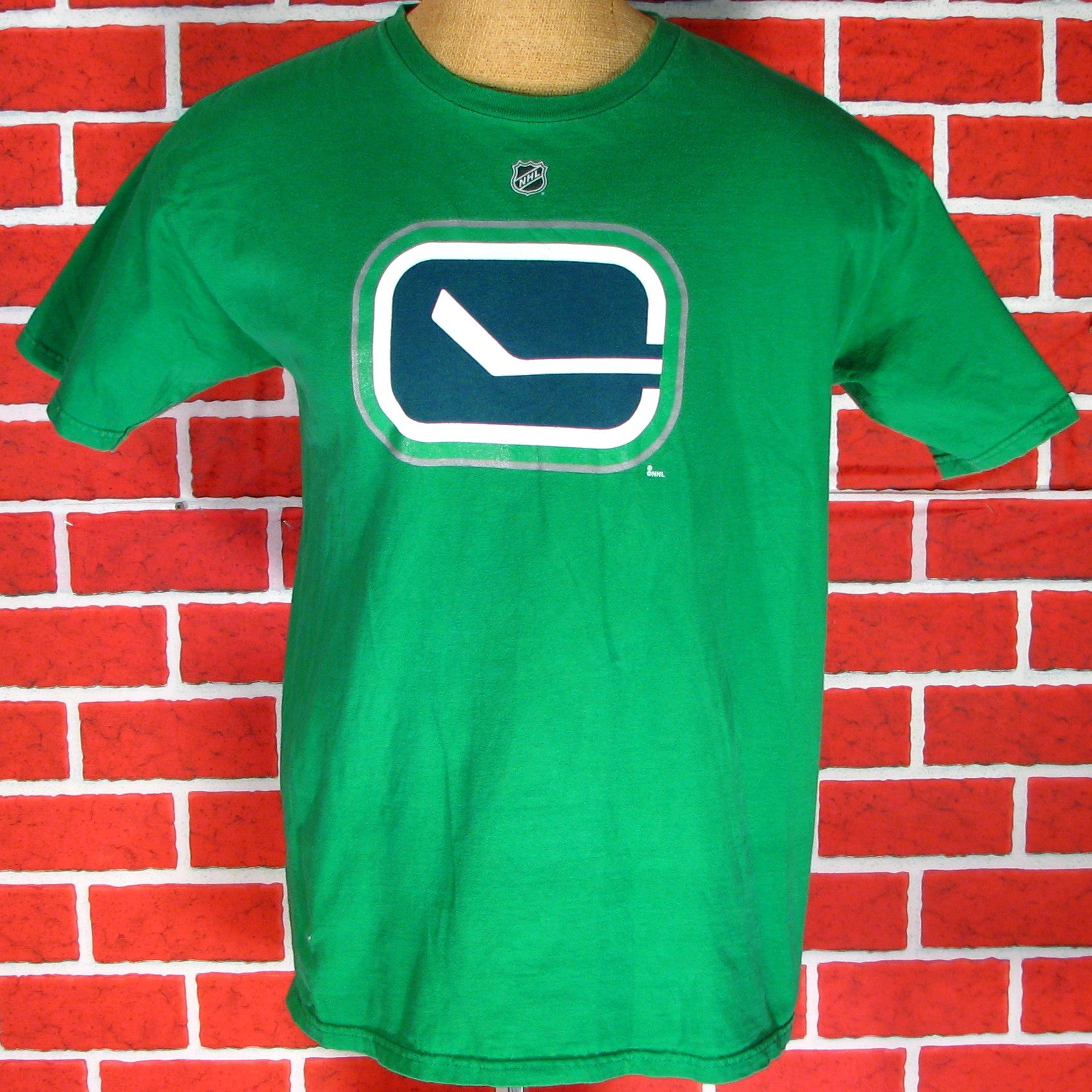 canucks tee shirts