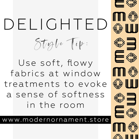 Modern Ornament Style Tip:  Use soft, flowy fabrics at window treatments to evoke a sense of softness in the room.