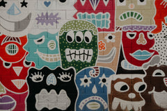 Colorful Graffiti Style Wall Art showing faces with different emotions 