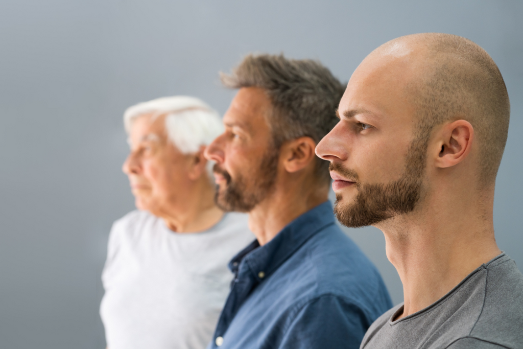 An elderly father and his two sons. Genetics can be a risk factor for type 2 diabetes