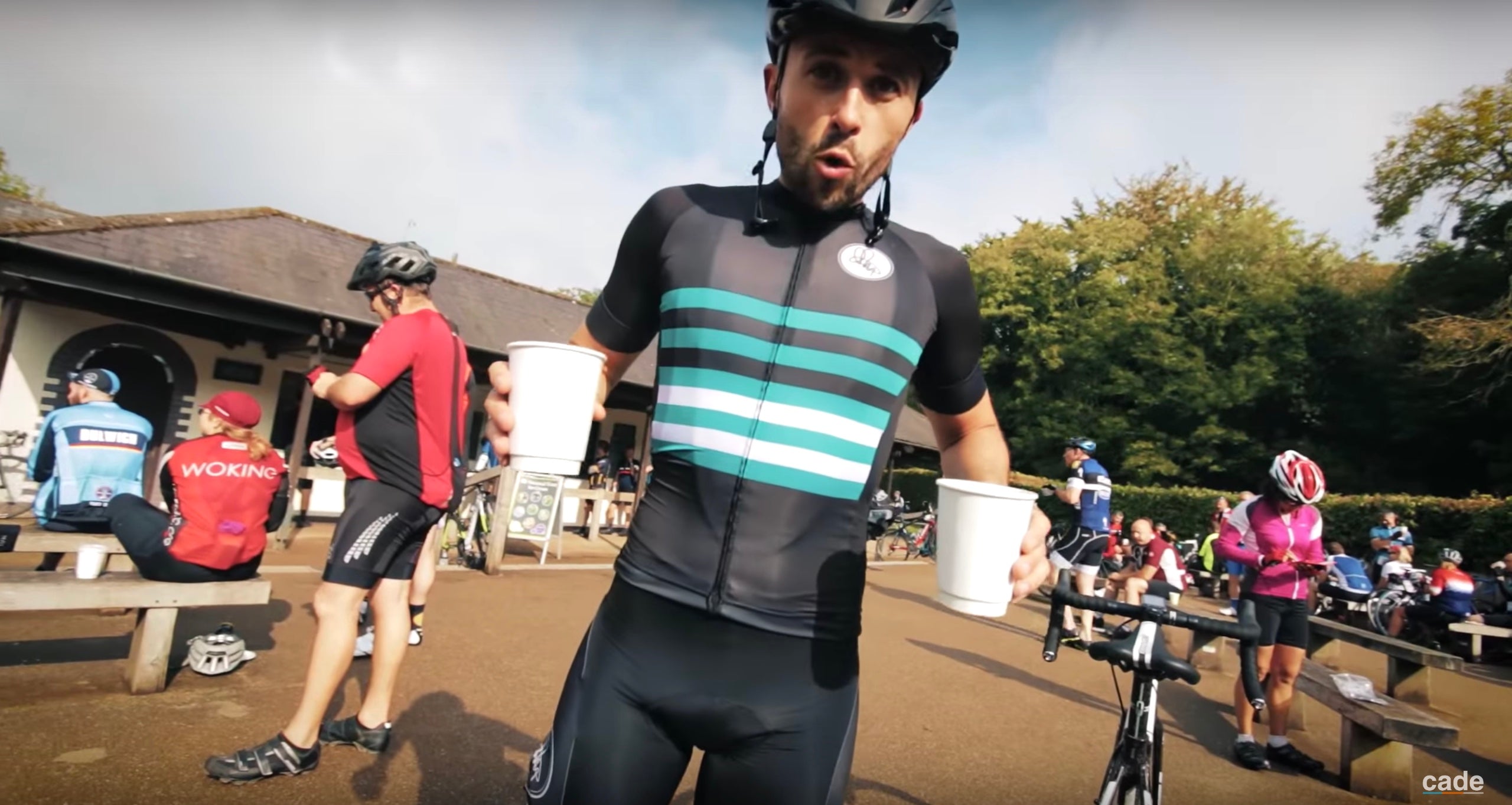 Jimmi wears Attacus Cycling jersey and bib shorts at the top of Box Hill