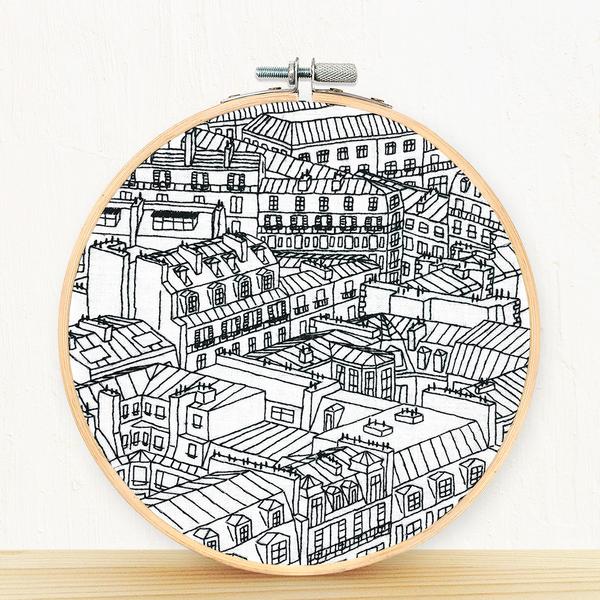 https://cdn.shopify.com/s/files/1/2682/5886/products/Rooftops-of-Paris-France-Embroidery-Kit-1_720x.jpg?v=1655490372