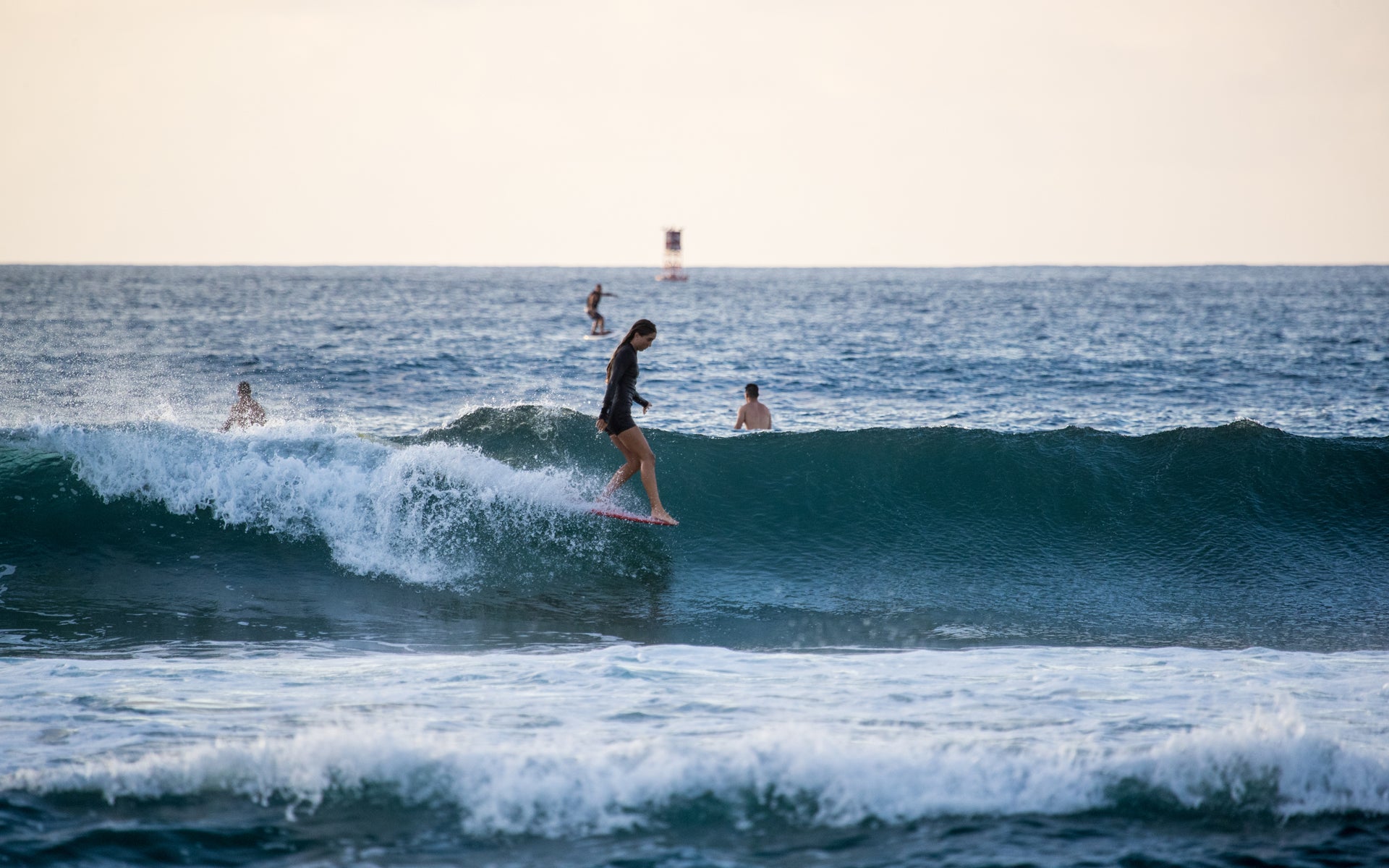 Bella Ebrez rides the waves of Haleiwa