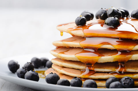 Pancakes with berries and maple syrup blog image