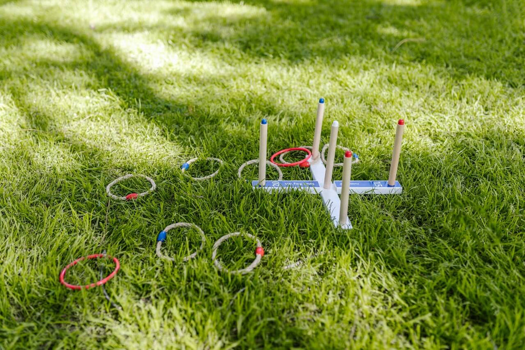 ring toss game on a green