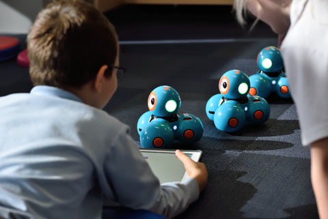 Kids playing with coding toys