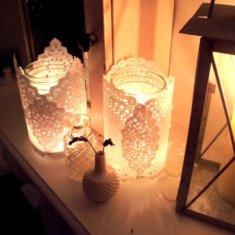Lantern wrapped in paper doilies