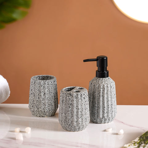 Stoneware bath set with soap dispenser and toothbrush holder