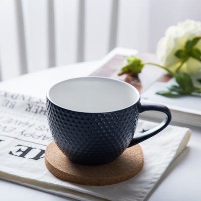 Coffee cup with coaster