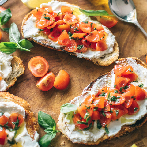 Toast with ricotta cheese and cherry tomatoes