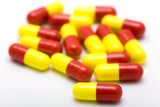 Remember to take your pills including a group of red and yellow pills 