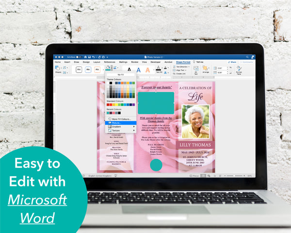 Editing Trifold Pink Rose Funeral Program Template on a computer in Word