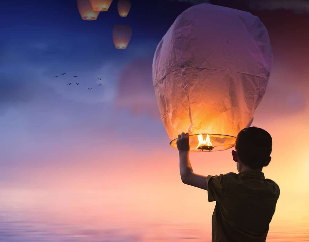 Release lanterns into the night sky for loved one