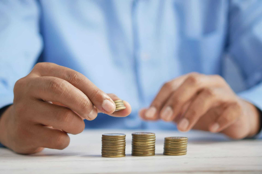 Man counting the cost of a funeral