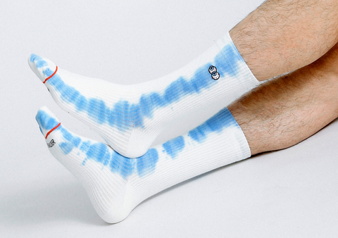 blue and white tie dye men's sock with eyes