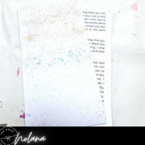 letter with rainbow splatter background 