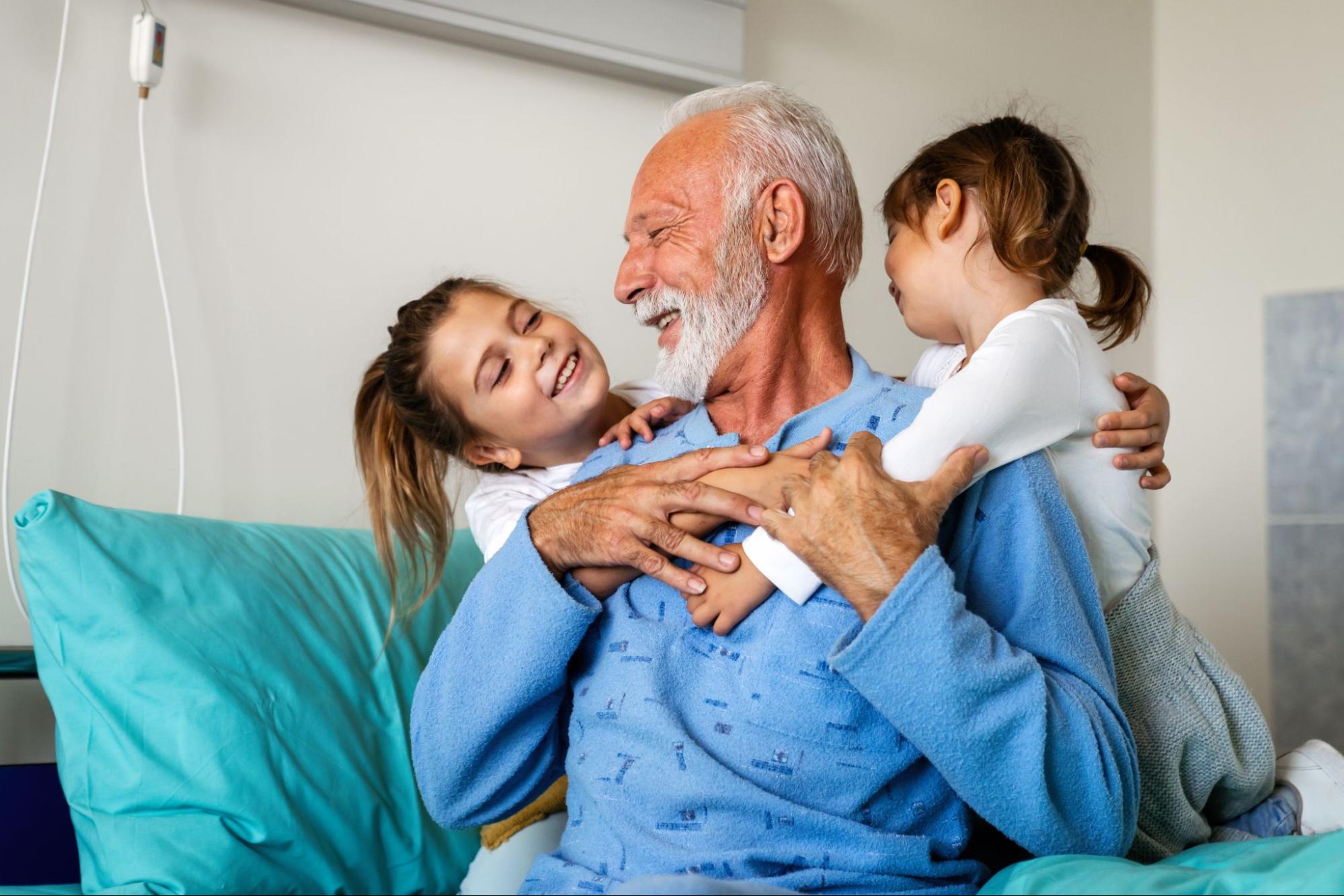 Old man happy with his long hospital stay