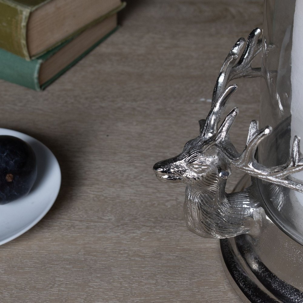 Product photograph of Hill Interiors Stag Heads Hurricane Lantern In Silver from Olivia's.