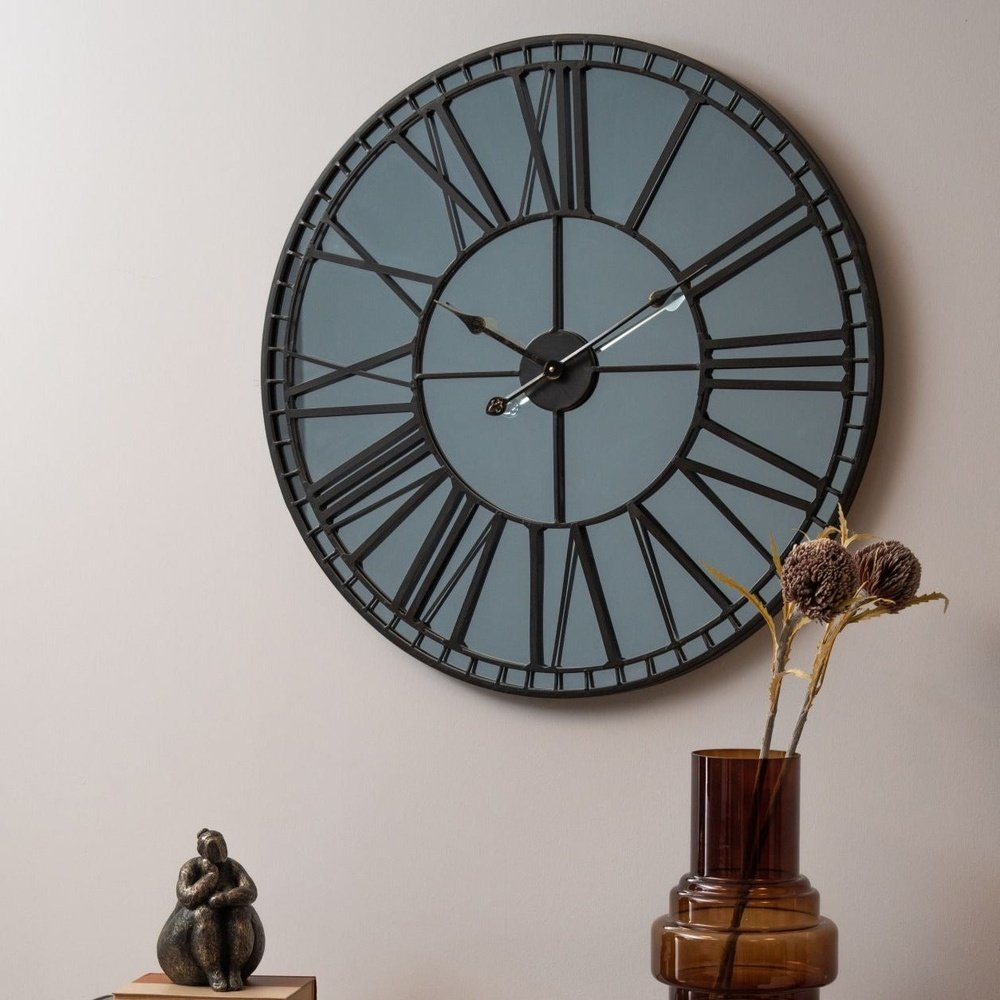 Product photograph of Libra Interiors Skeleton Mirror Wall Clock In Black from Olivia's.