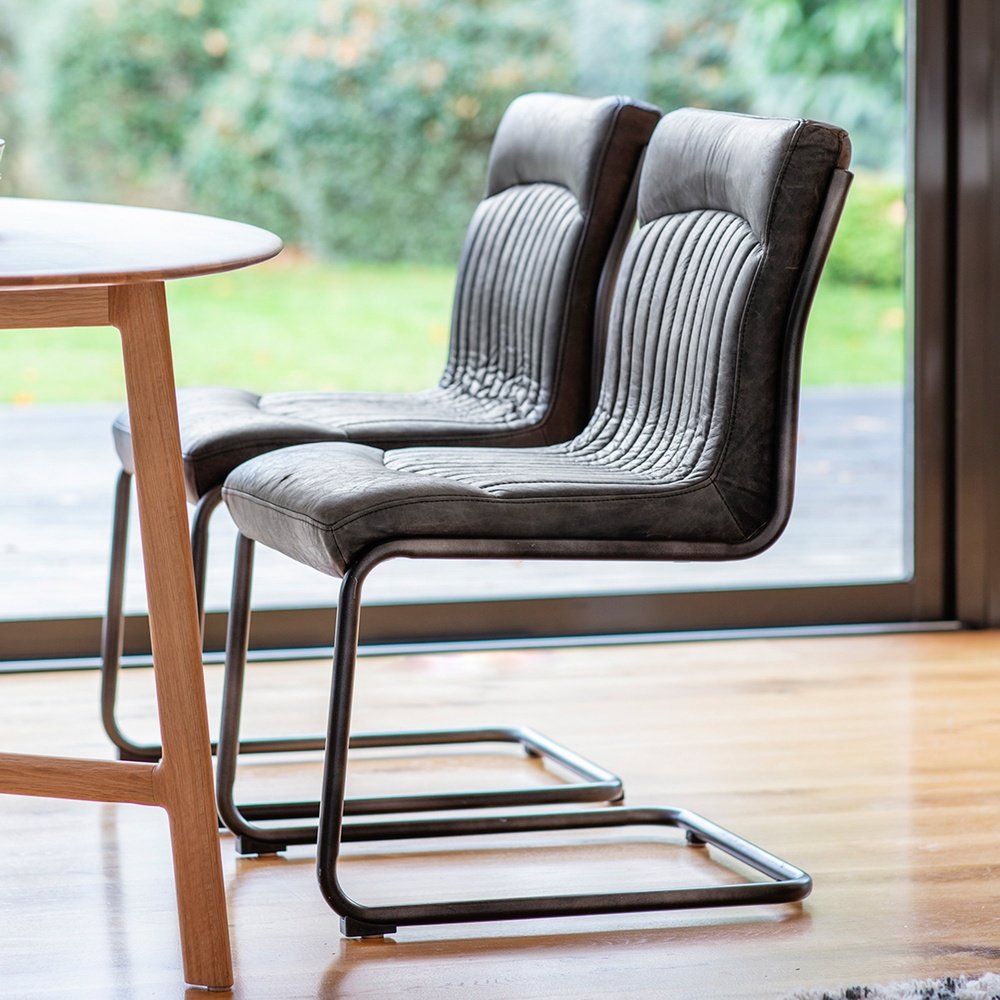 Product photograph of Gallery Interiors Capri Leather Dining Chair In Antique Ebony from Olivia's.