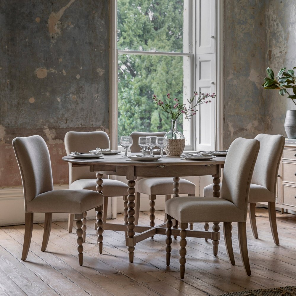 Product photograph of Gallery Interiors Abingdon Round Extendable Dining Table from Olivia's.