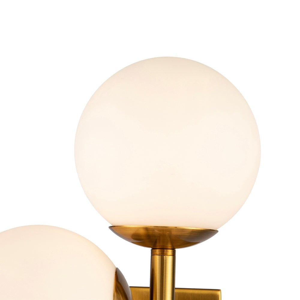 Product photograph of Liang Eimil Vanessa Wall Lamp Brass Opal Glass from Olivia's.