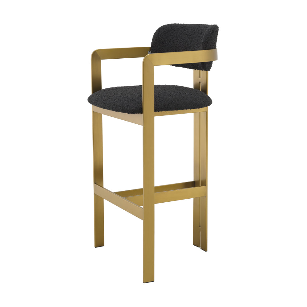 Product photograph of Eichholtz Donato Bar Stool In Brushed Brass Boucl Black from Olivia's.