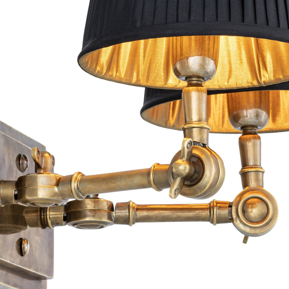 Product photograph of Eichholtz Wentworth Double Wall Lamp Wentworth In Vintage Brass With Black Shade from Olivia's.