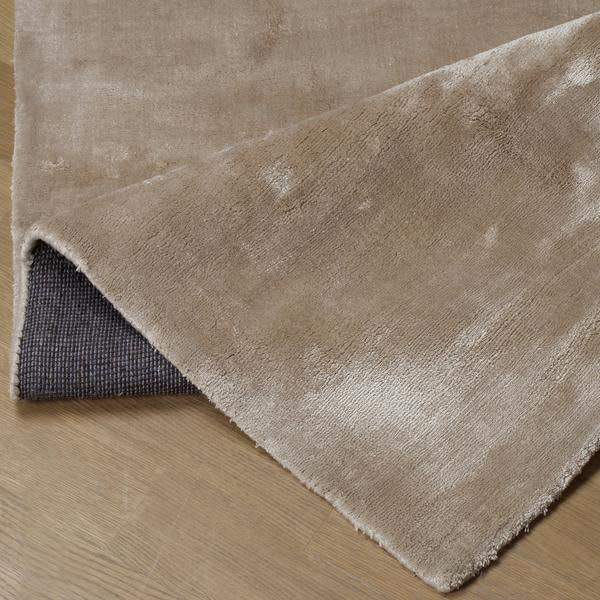 Product photograph of Andrew Martin Aurum Rug Sand 366 X 4 X 275cm from Olivia's.