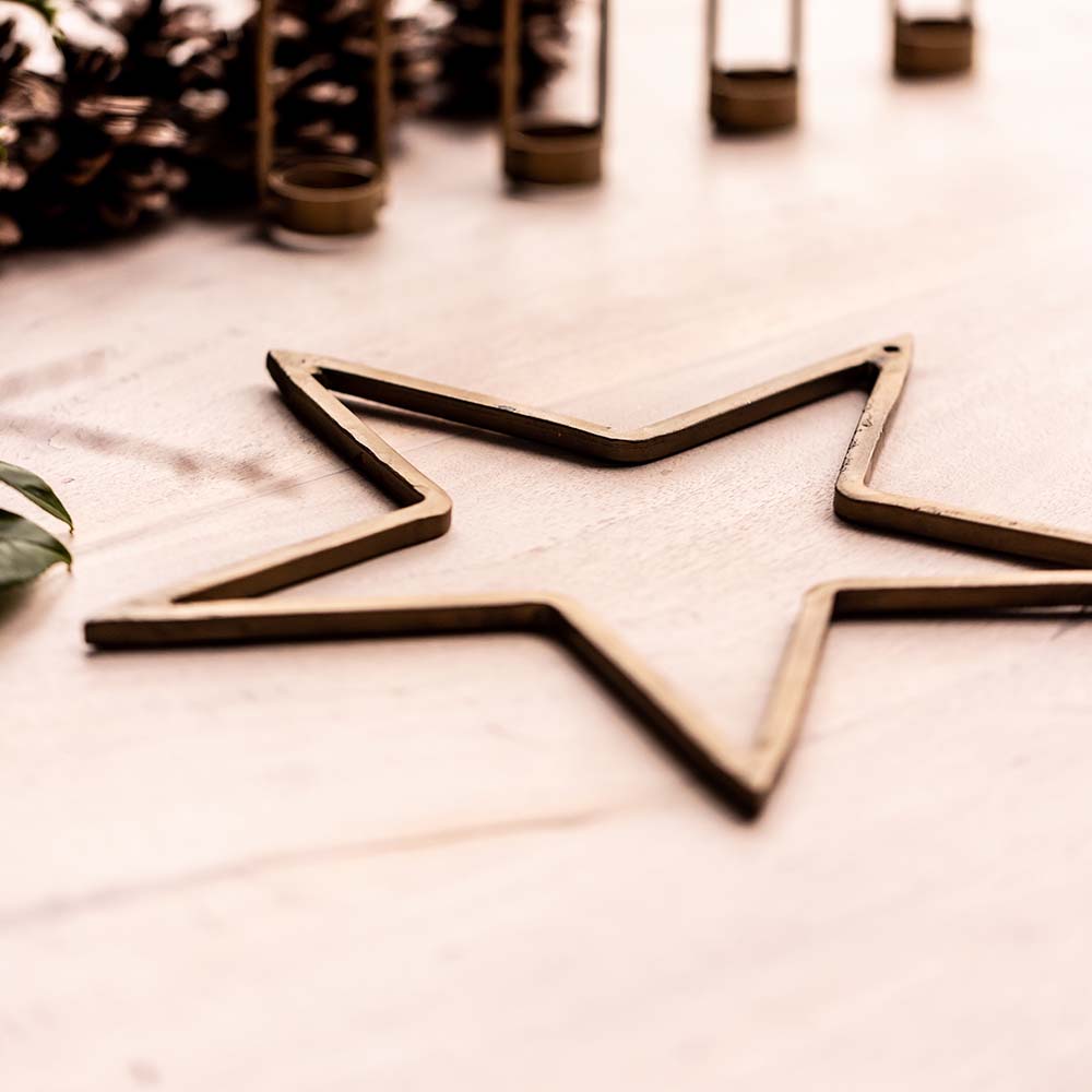 Product photograph of Nkuku Christmas D Cor Meru Brass Star Antique Brass Medium from Olivia's.