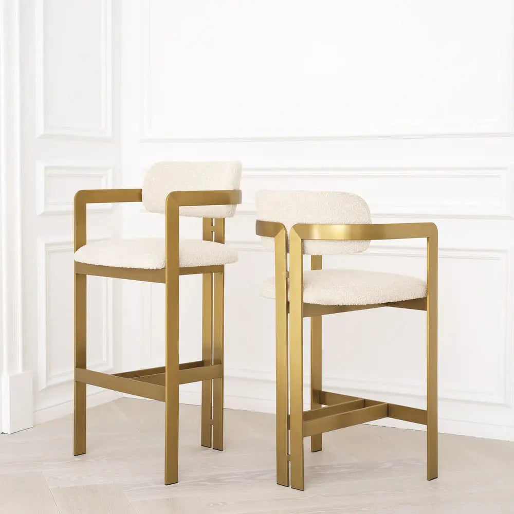 Product photograph of Eichholtz Cliff Brushed Brass Finish Counter Stool In Donato Cream Boucl from Olivia's.