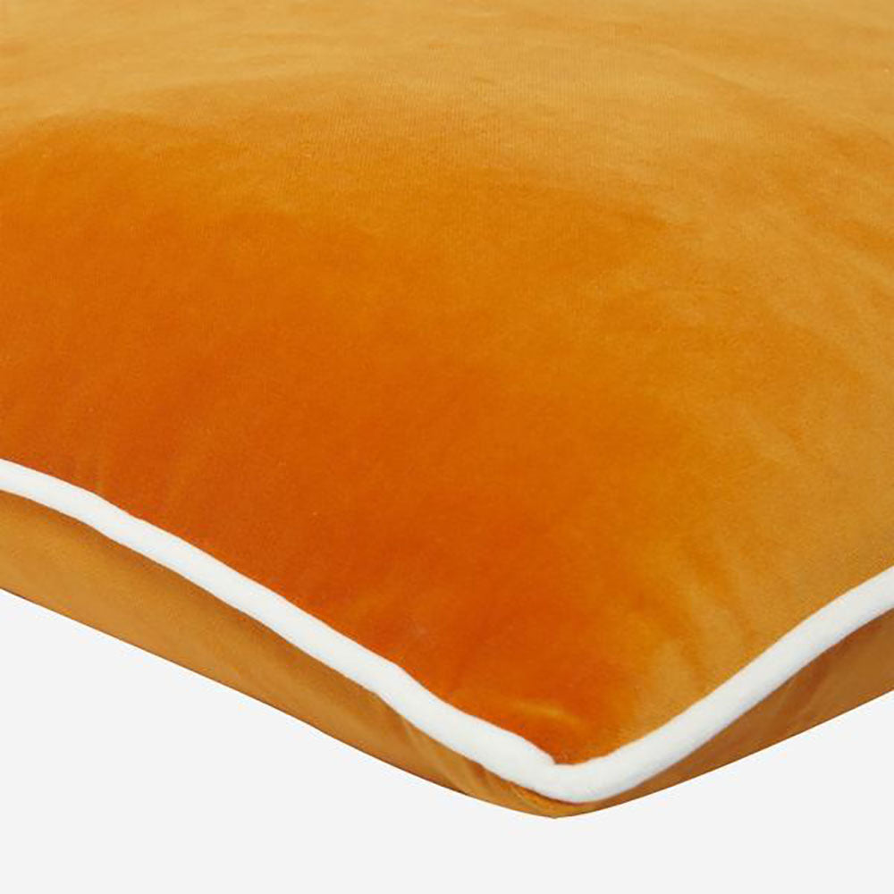 Product photograph of Andrew Martin Pelham Piping Cushion Clementine White from Olivia's.