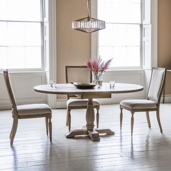 Product photograph of Gallery Interiors Mustique 4-6 Seater Round Extending Dining Table from Olivia's