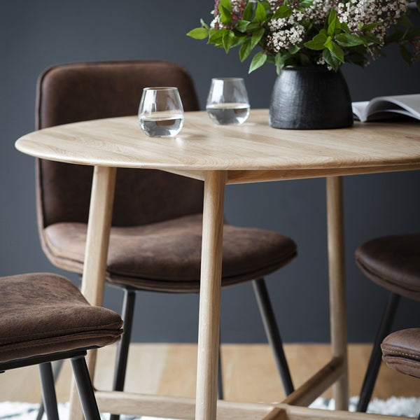 Product photograph of Gallery Interiors Madrid Brown Round 4 Seater Dining Table from Olivia's.