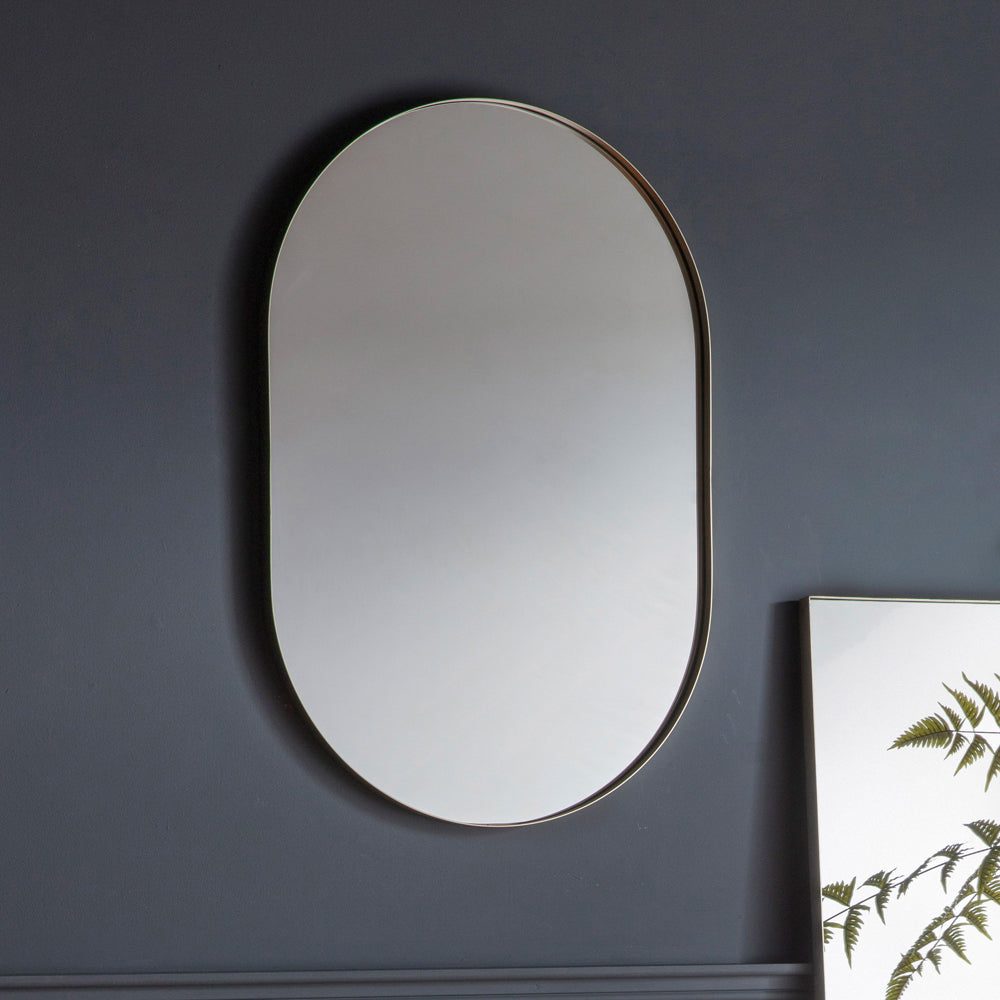 Product photograph of Gallery Interiors Hurston Elipse Silver Wall Mirror from Olivia's.