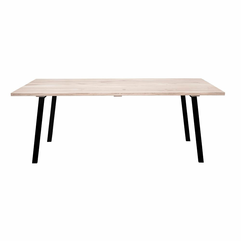 Product photograph of Bloomingville Cozy Dining Table In Natural Oak Black Legs from Olivia's