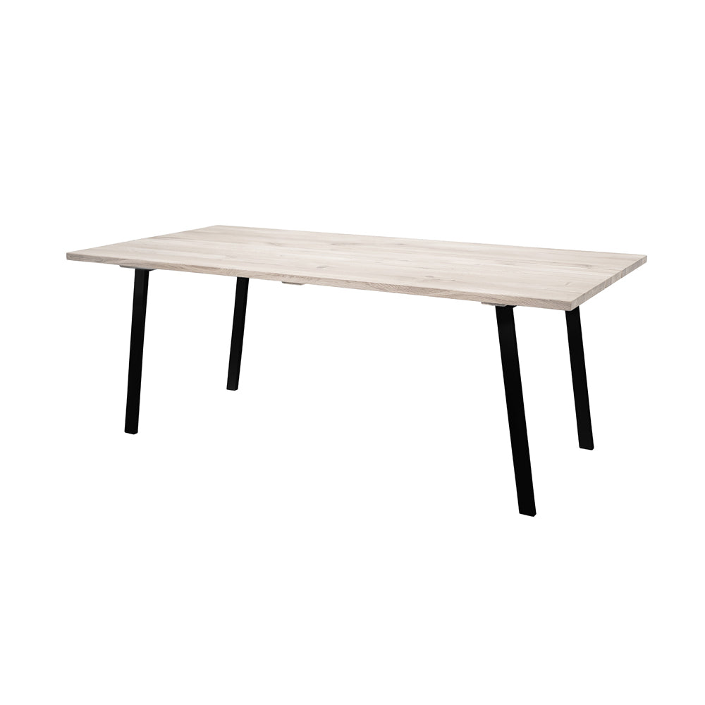 Product photograph of Bloomingville Cozy Dining Table In Natural Oak Black Legs from Olivia's.