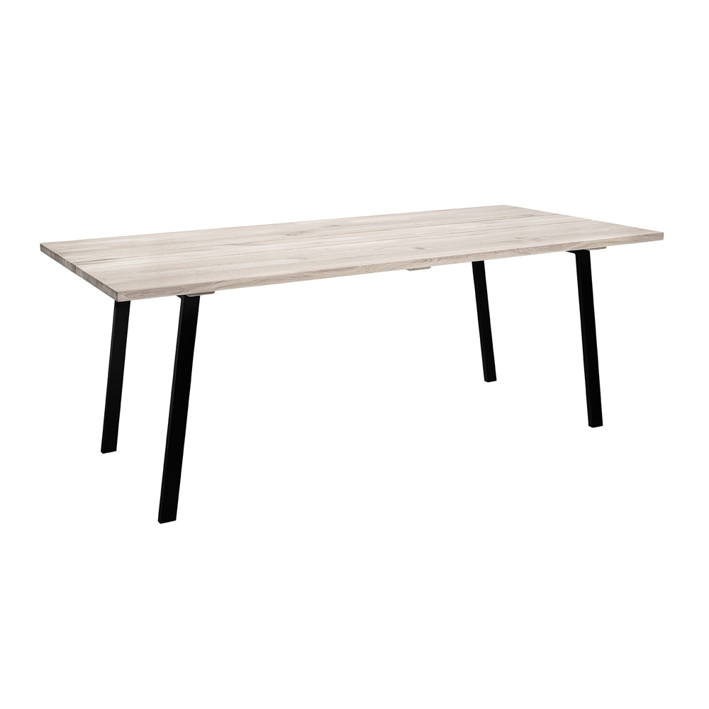 Product photograph of Bloomingville Cozy Dining Table In Natural Oak Black Legs from Olivia's.