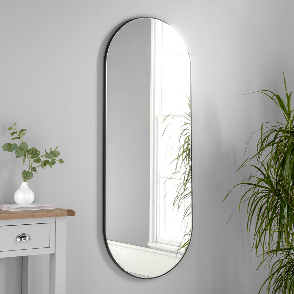 Product photograph of Olivia S Andora Oval Wall Mirror In Black from Olivia's