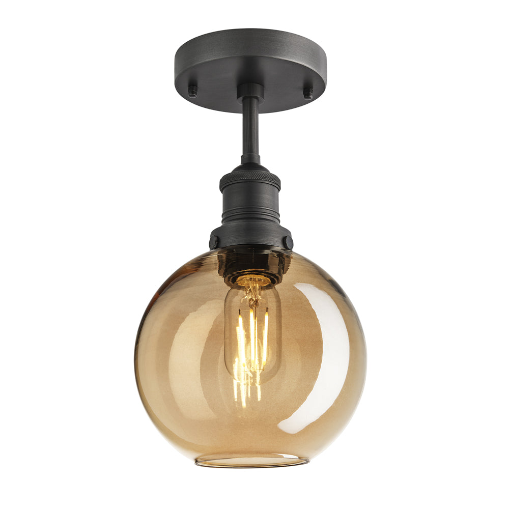 Product photograph of Industville Brooklyn Tinted Glass Globe Amber Flush Mount Light 7 Inch Brass Holder from Olivia's.