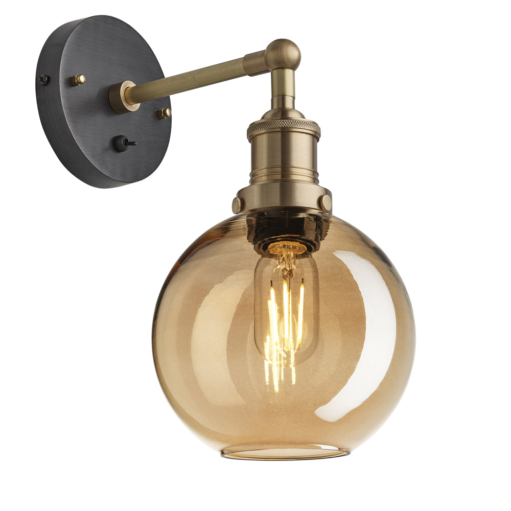 Product photograph of Industville Brooklyn Tinted Glass Globe Amber Wall Light 7 Inch Brass Holder from Olivia's
