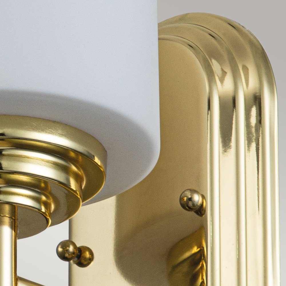 Product photograph of Feiss Malibu 1 Light Wall Light In Polished Brass from Olivia's.