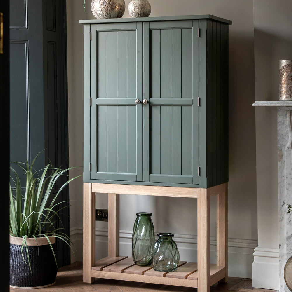 Product photograph of Gallery Interiors Sandon 2 Door Cupboard In Moss from Olivia's.