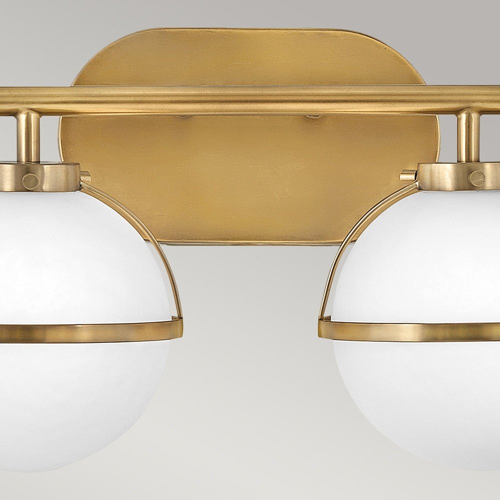 Product photograph of Hinkley Hollis 2 Light Wall Light In Brass Clear Glass from Olivia's.