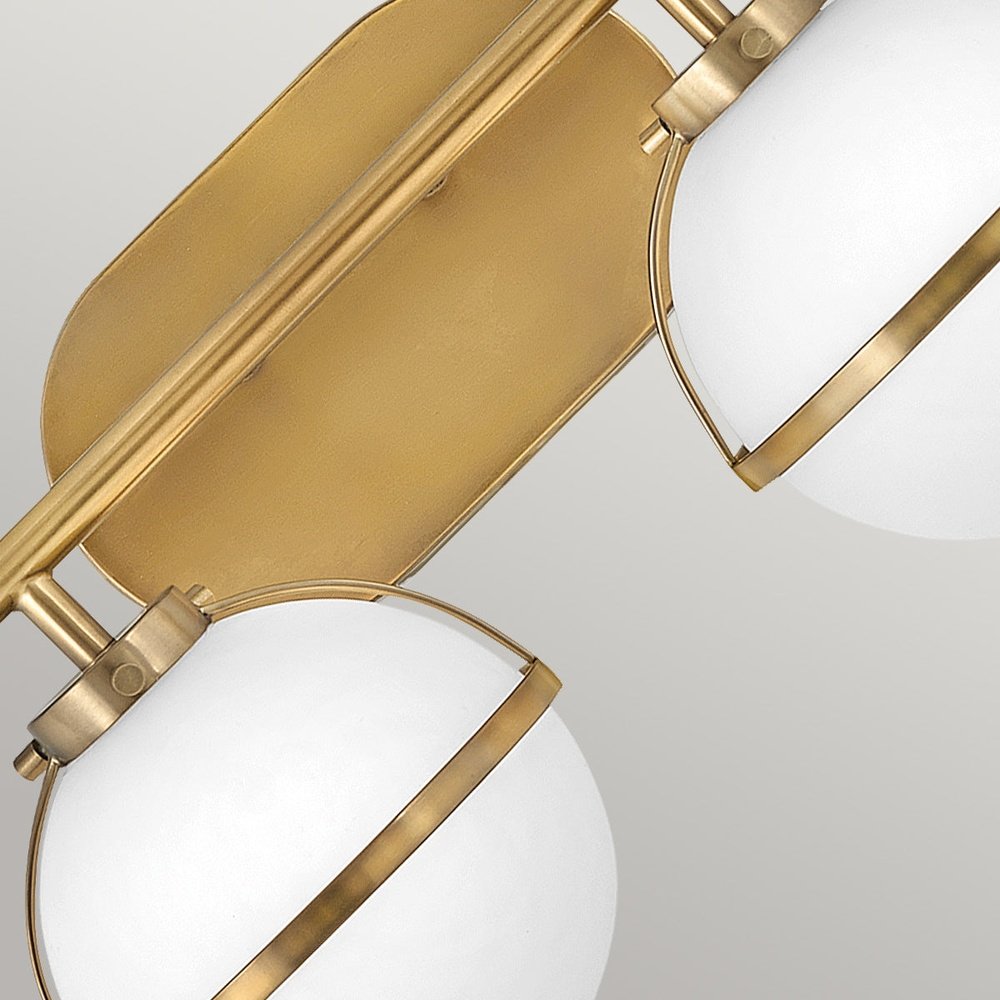 Product photograph of Hinkley Hollis 2 Light Wall Light In Brass Clear Glass from Olivia's.