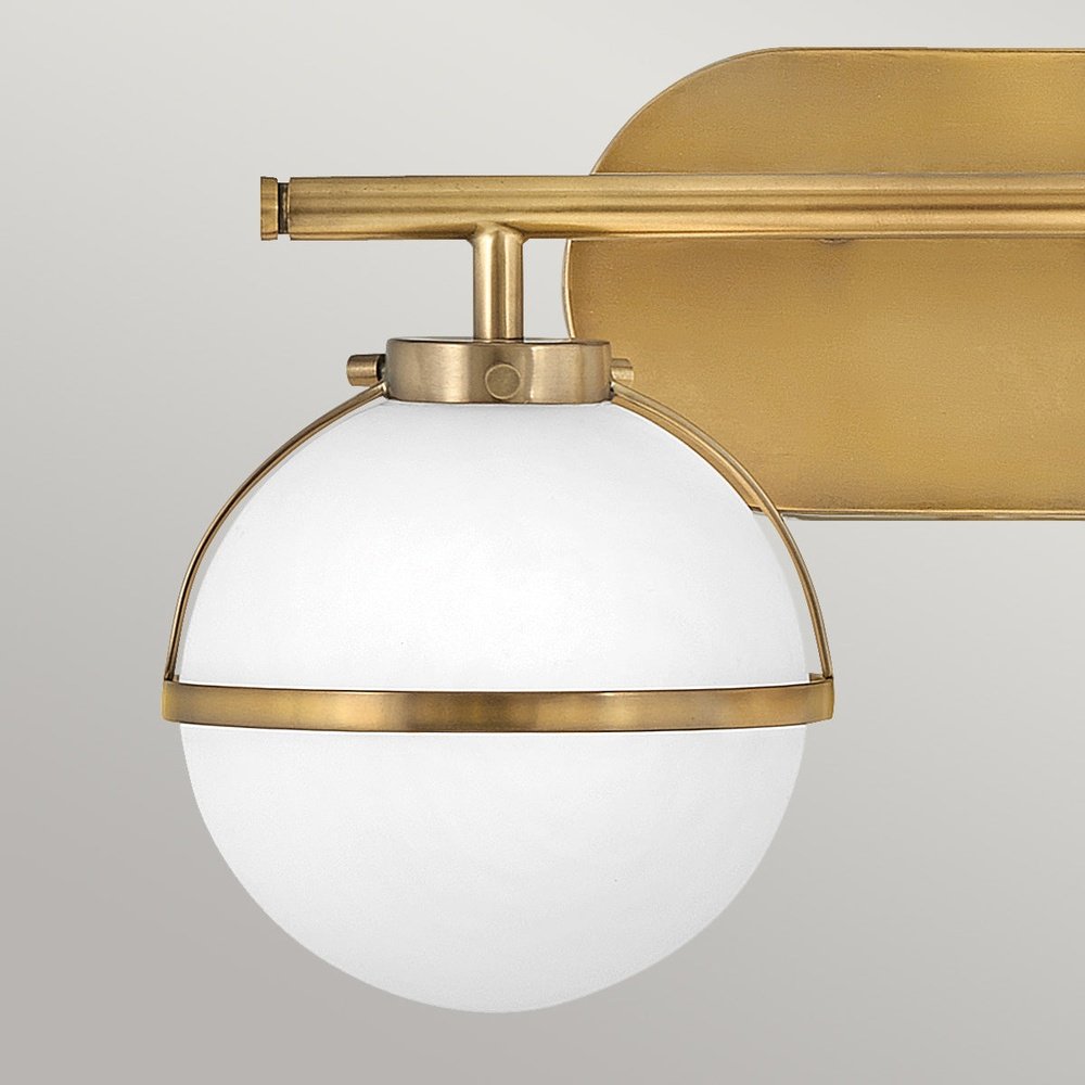 Product photograph of Hinkley Hollis 2 Light Wall Light In Brass Clear Glass from Olivia's.