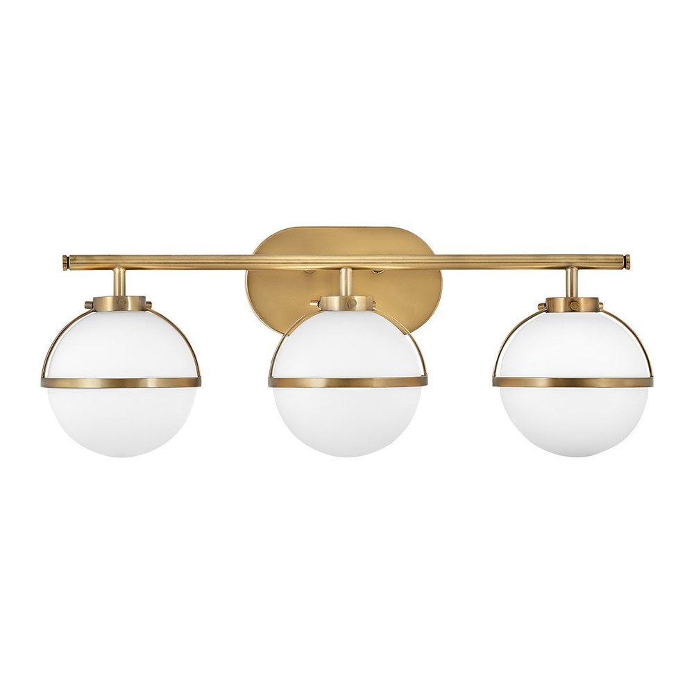 Product photograph of Hinkley Hollis 3 Light Wall Light In Brass Clear Glass from Olivia's