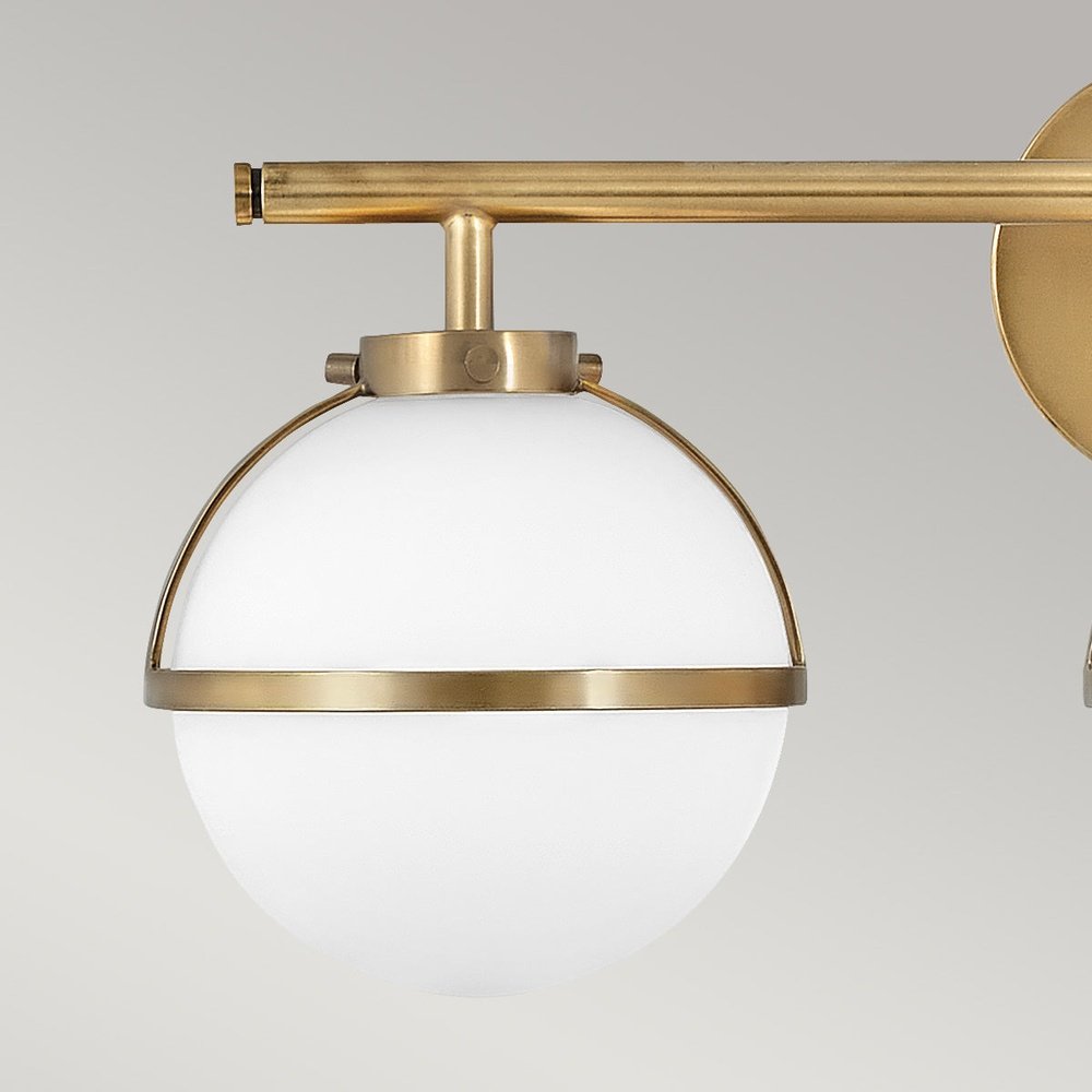 Product photograph of Hinkley Hollis 3 Light Wall Light In Brass Clear Glass from Olivia's.