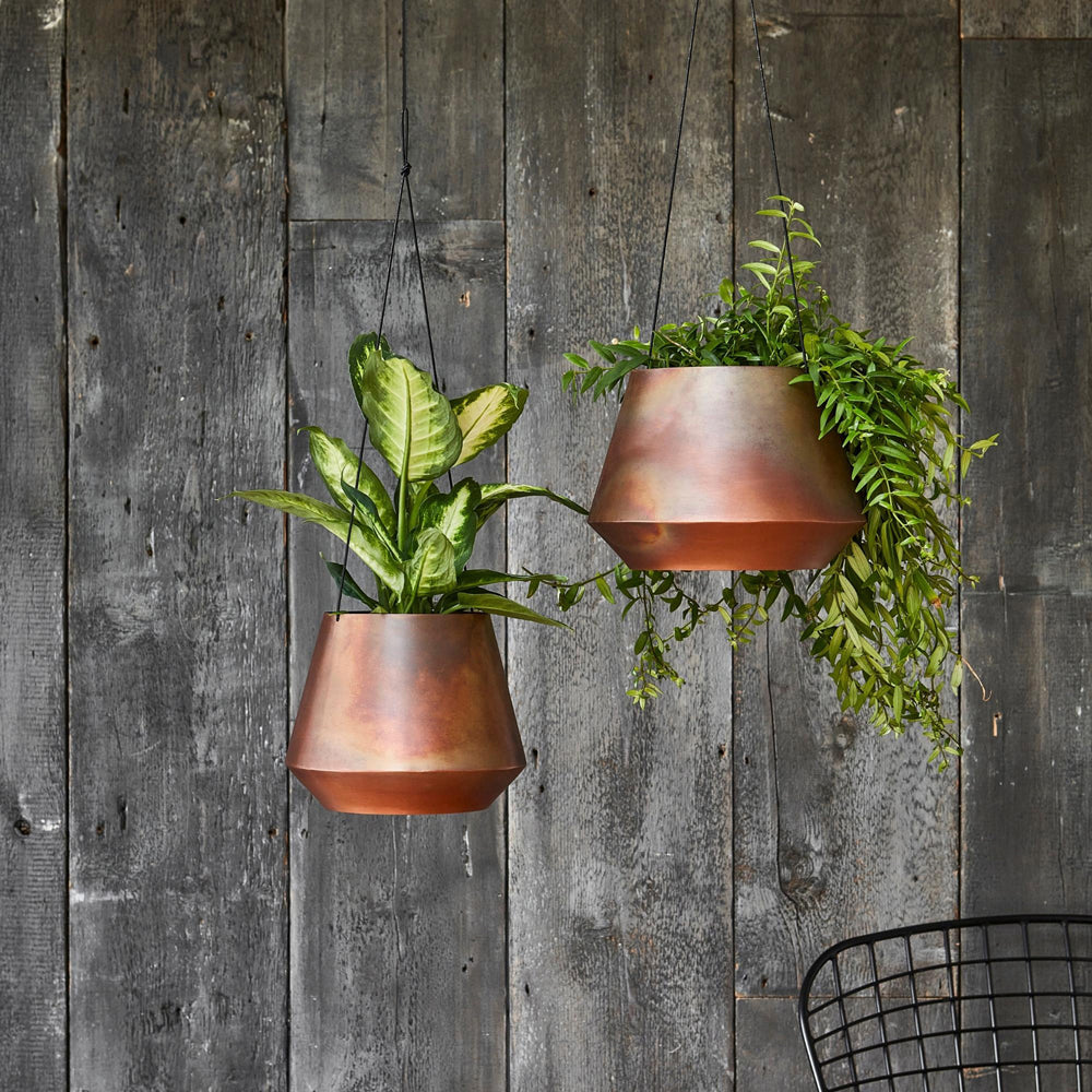 Product photograph of Ivyline Indoor Soho Aged Copper Hanging Planter With Leather Strap from Olivia's.